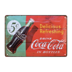 pubblicita della coca cola su lastra di metallo